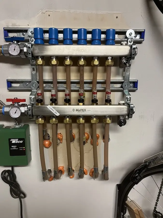 Plumber performing Gas Line Installation at a residential property in Baden